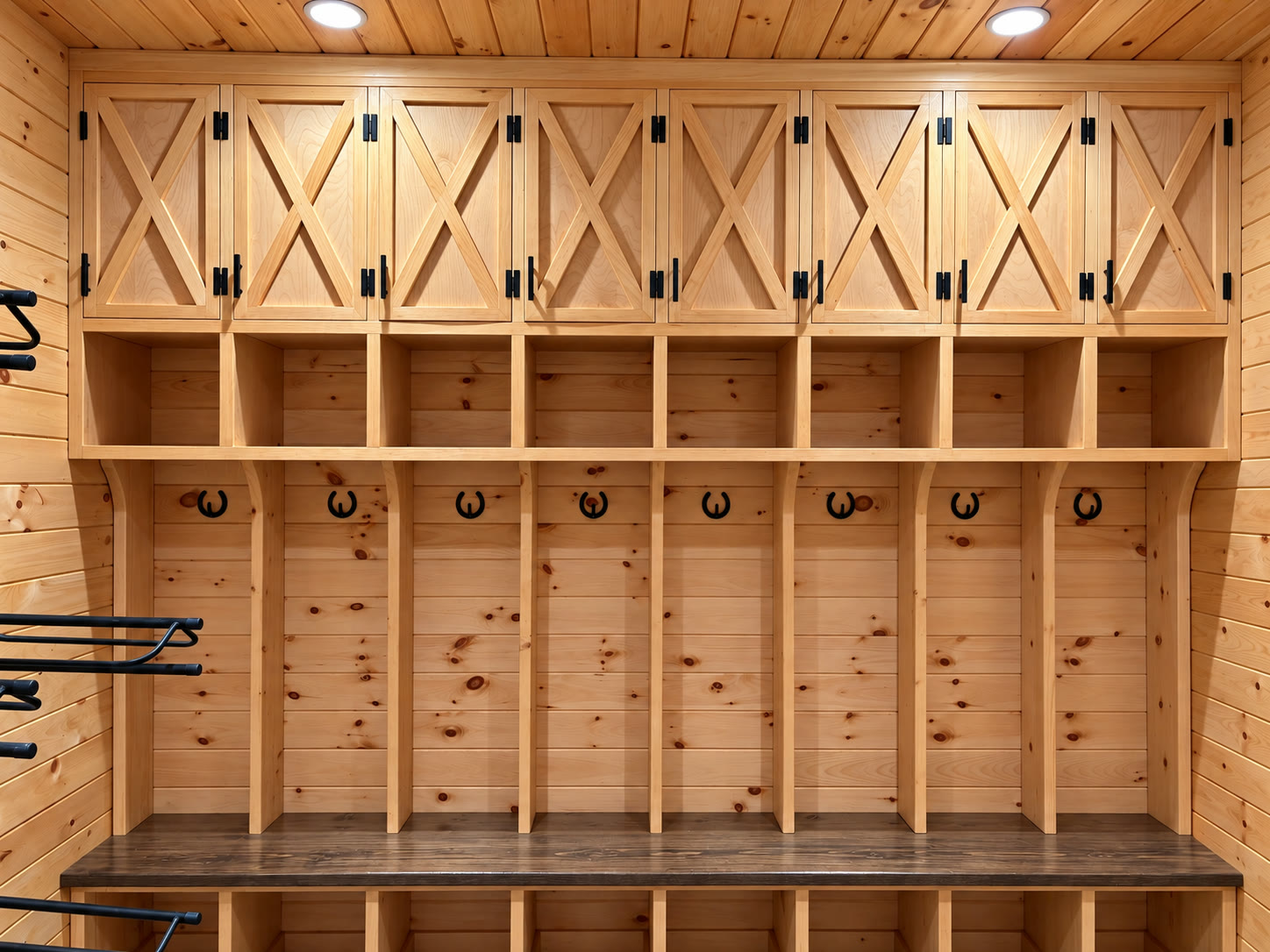 Row of stained wood cabinet doors in a barn tack room