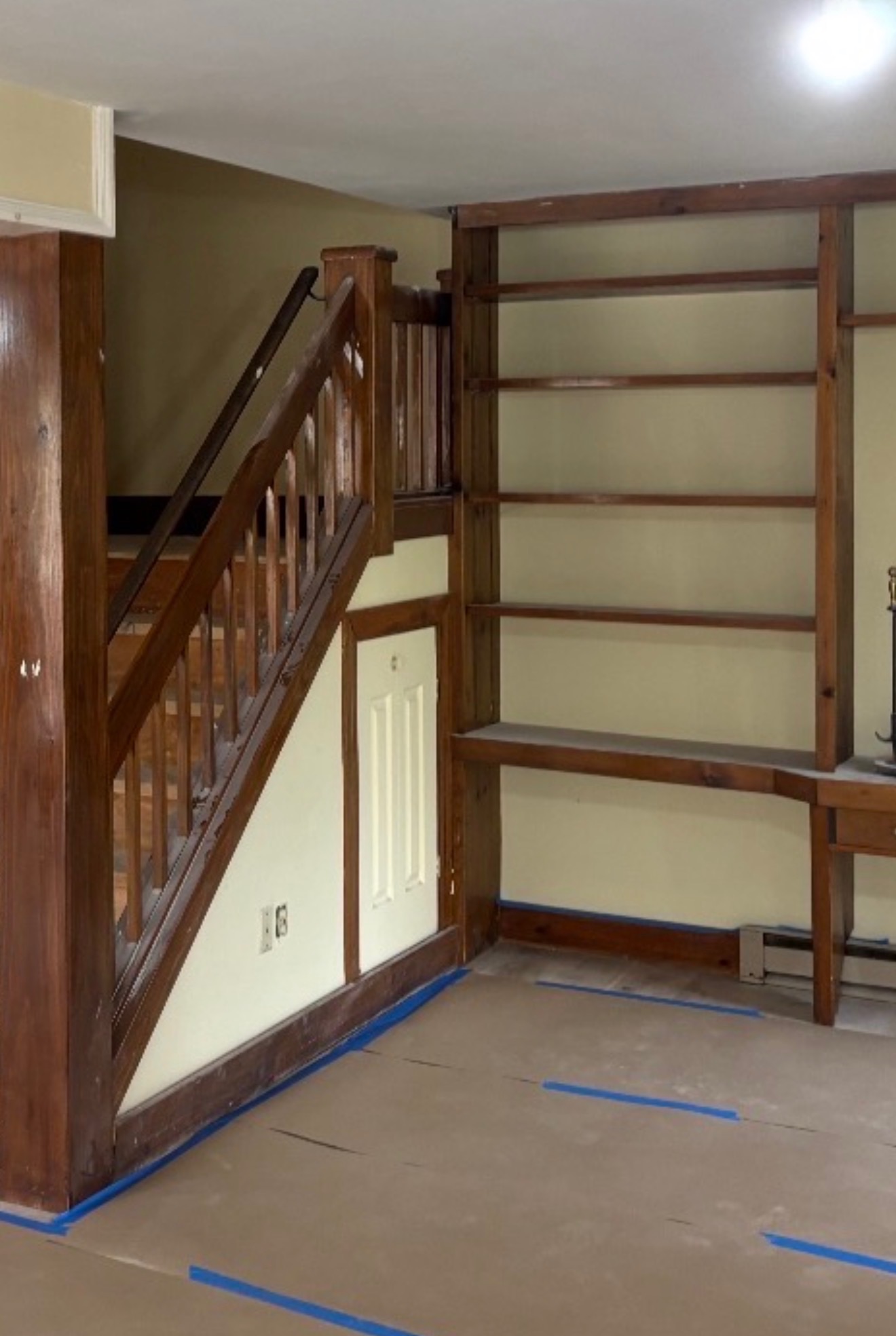 Floors and trim masked before interior painting