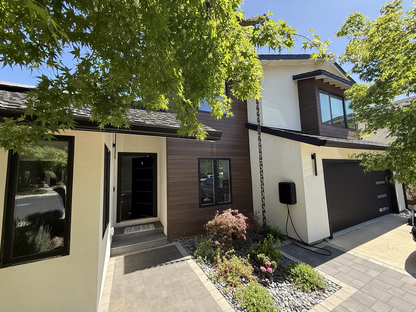 Finished residential exterior with wood siding and stucco