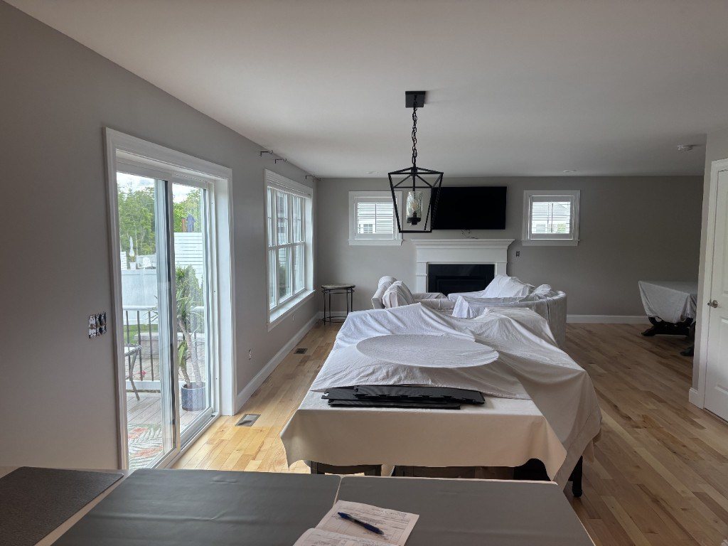 Living room protected and prepared for interior painting