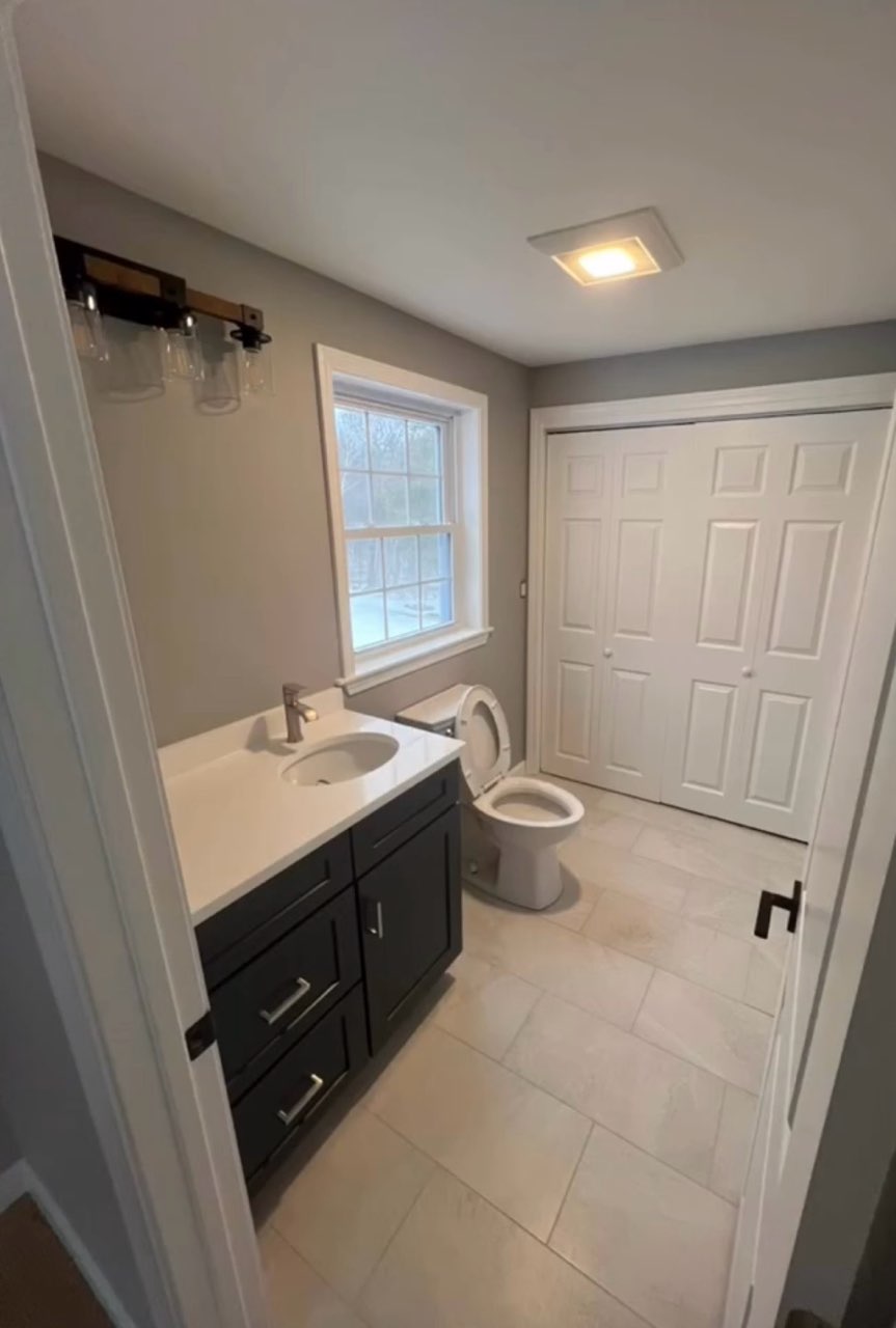 Finished bathroom walls, trim, and doors after painting