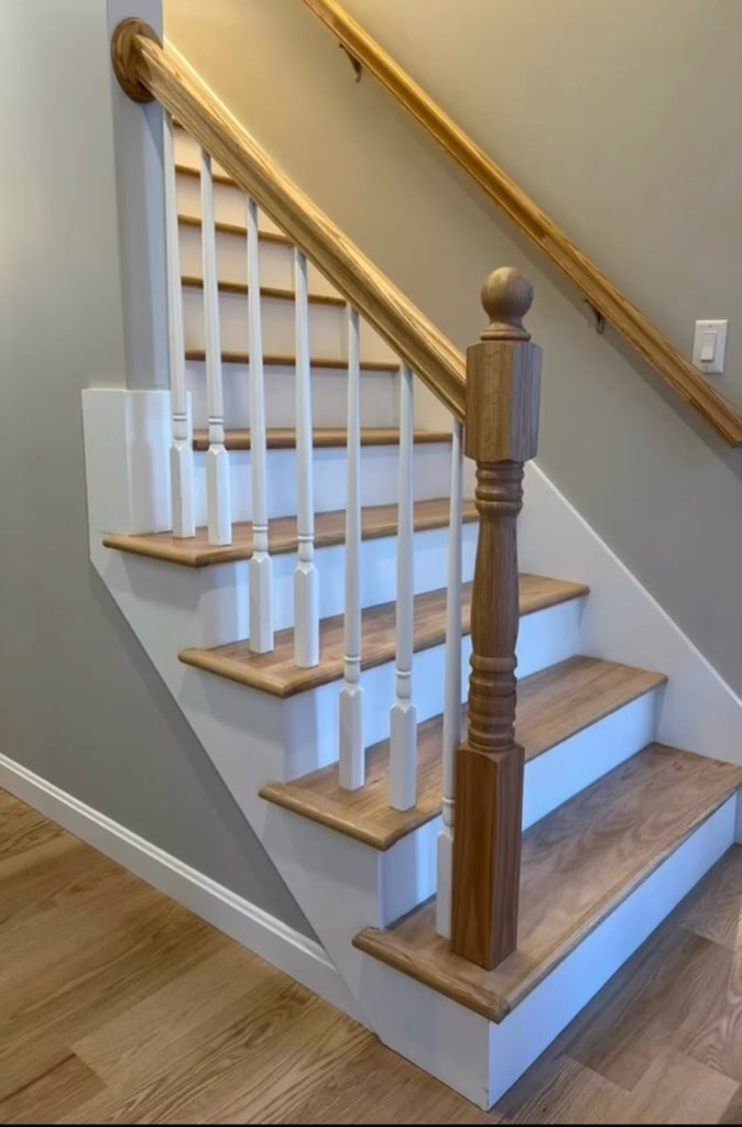 Finished staircase painting and wood refinishing