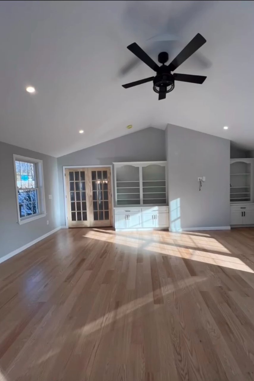 Finished vaulted living room interior painting