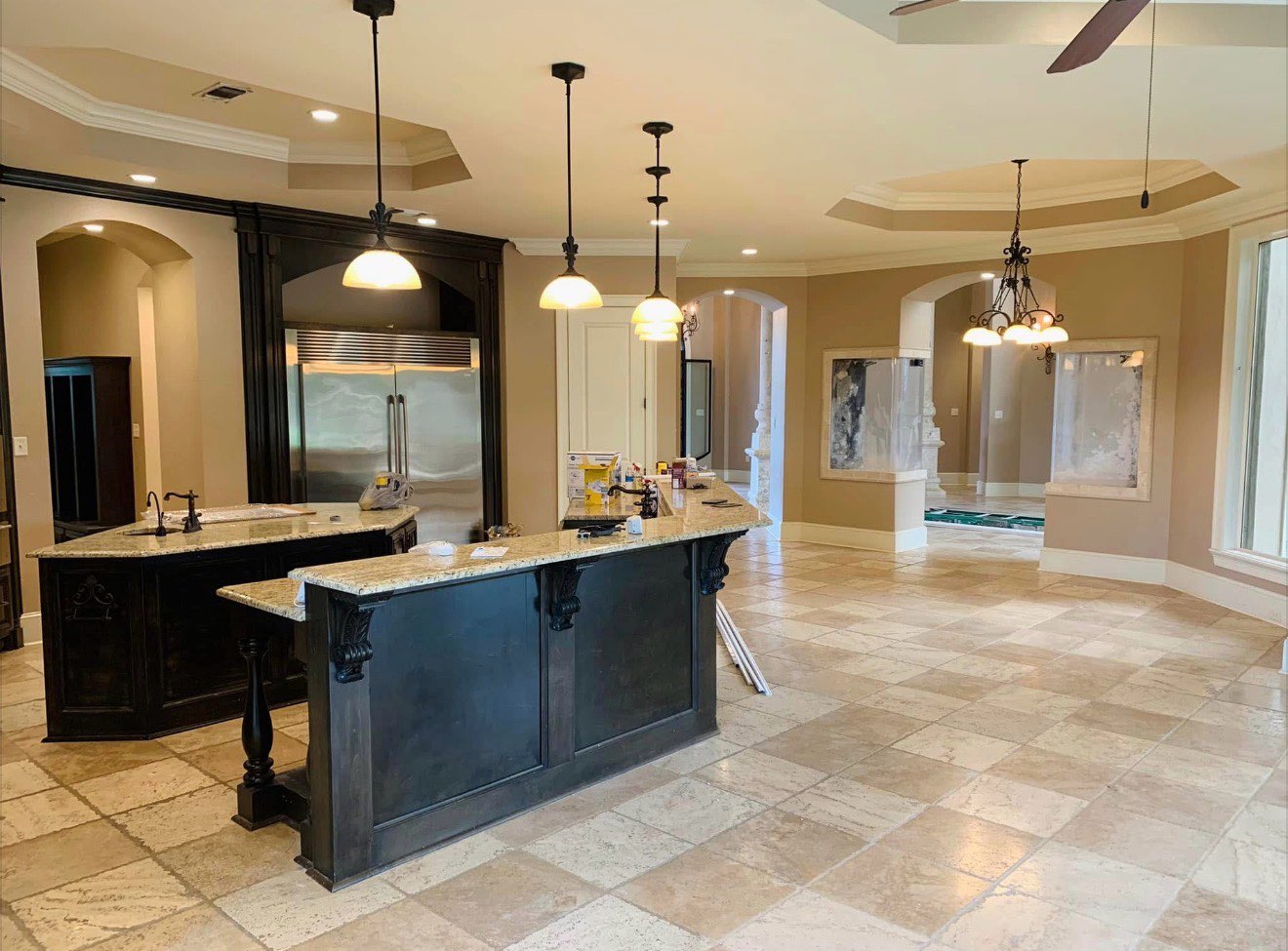 Finished interior painting in a large kitchen and living area