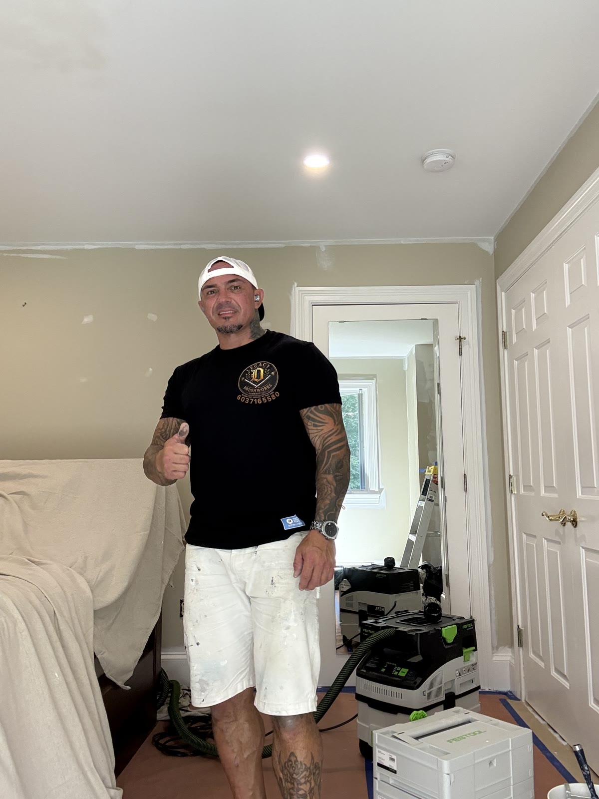 Legacy Brushworks painter on a jobsite