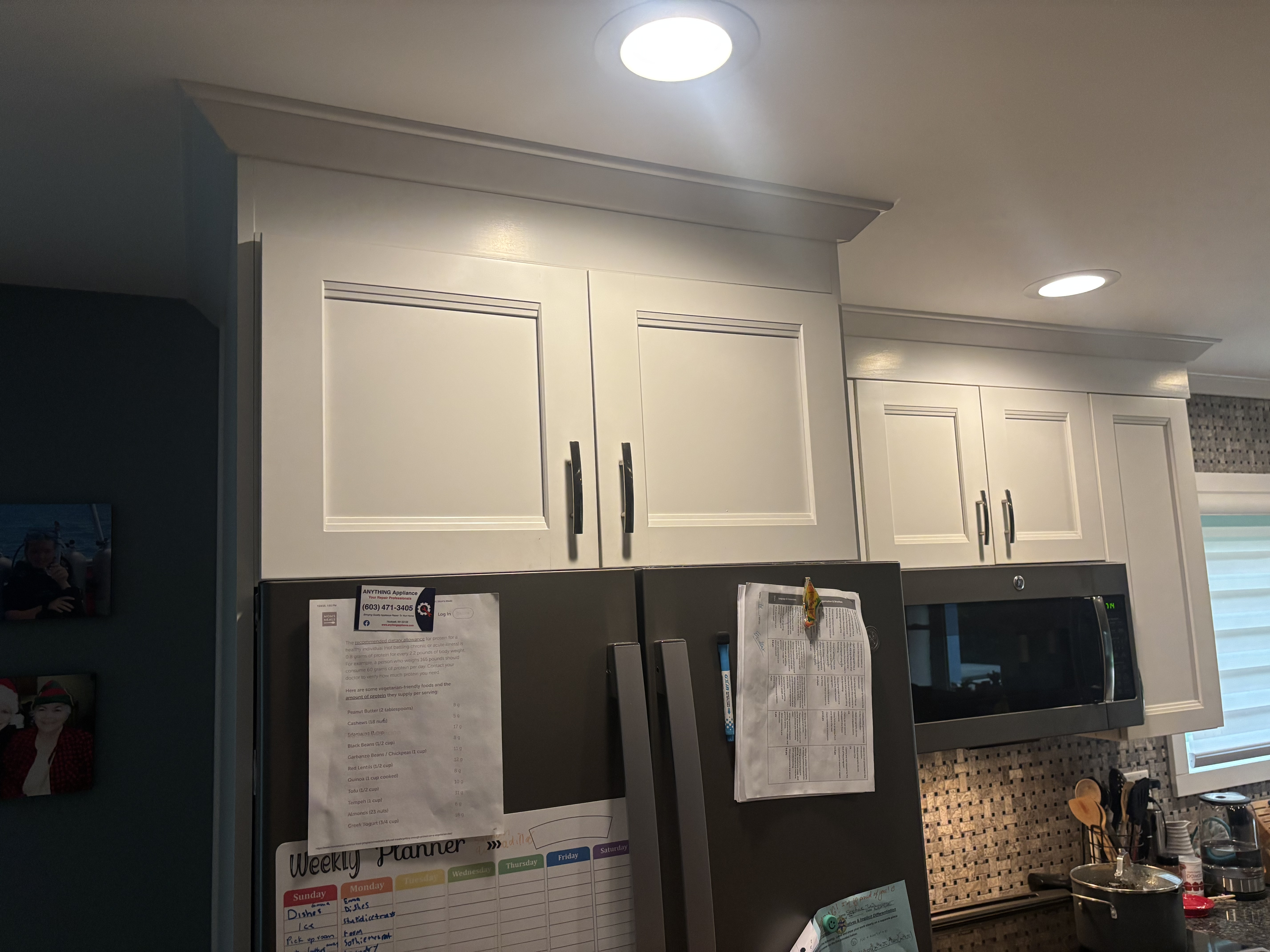 Finished white kitchen cabinets